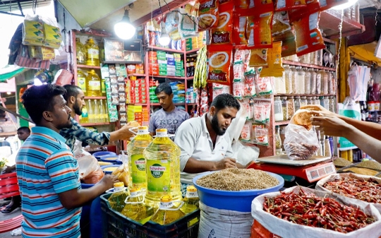 Men in a cereal shop