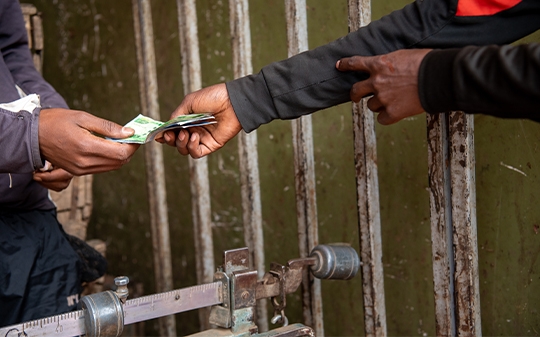 Two people exchanging money