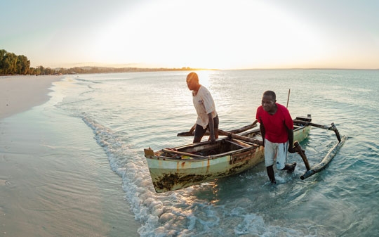 Men on a boat in Mozambique
