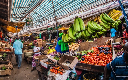 Market close-up in Kenya with bananas and fruits
