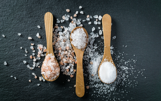 spoons with different salt crystals