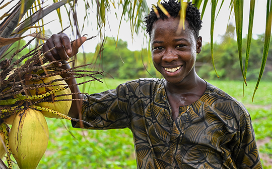 youth displaying crops